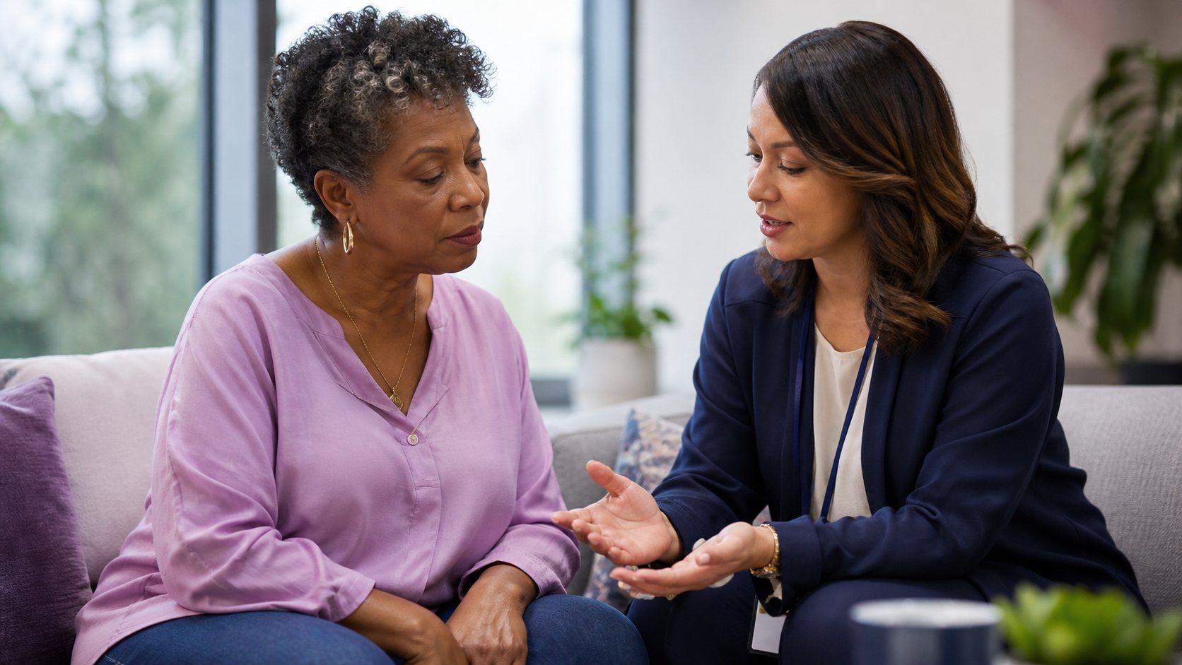 A patient navigator explains a sequence of next steps to an older patient