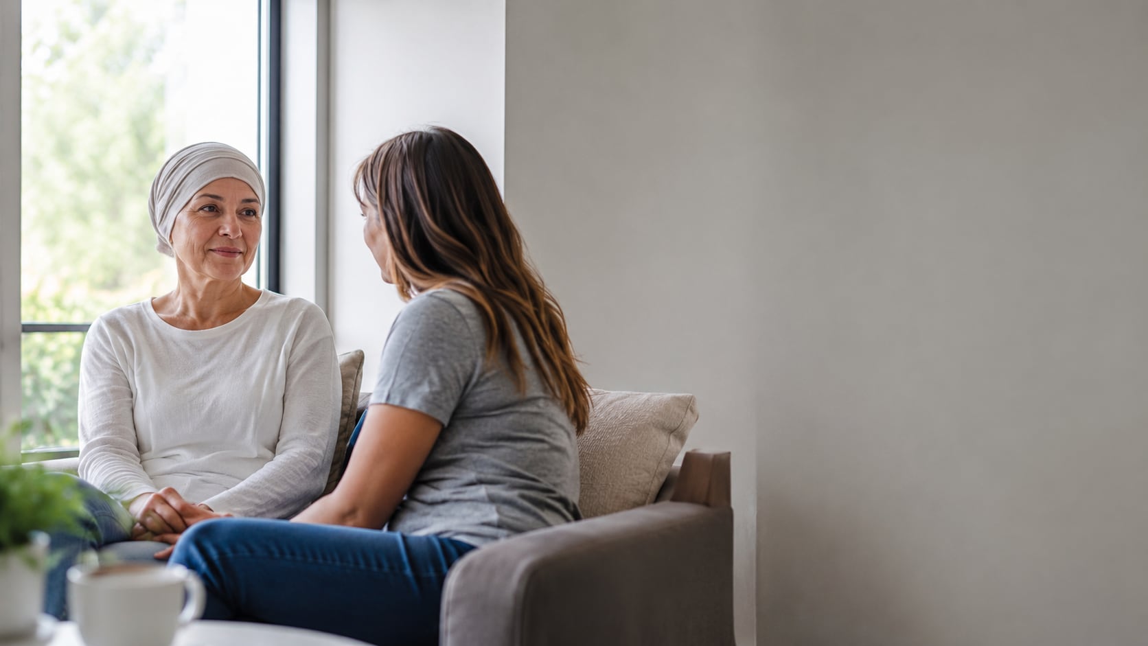 A radiation oncologist explaining a treatment plan schedule to a patient